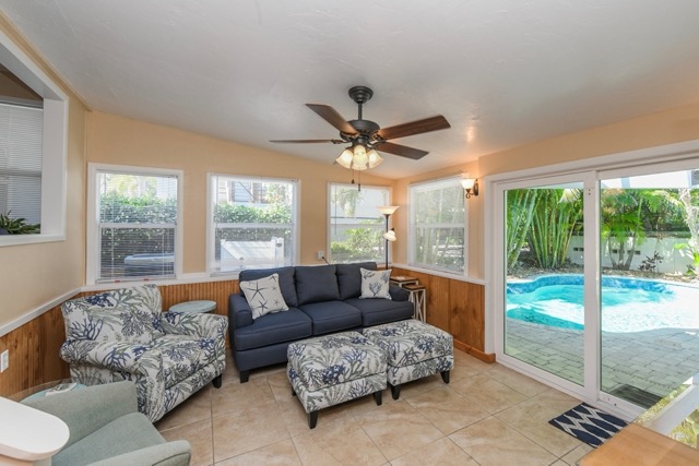 TV room overlooking the pool features a 55 inch HDTV with DVR and DVD player.